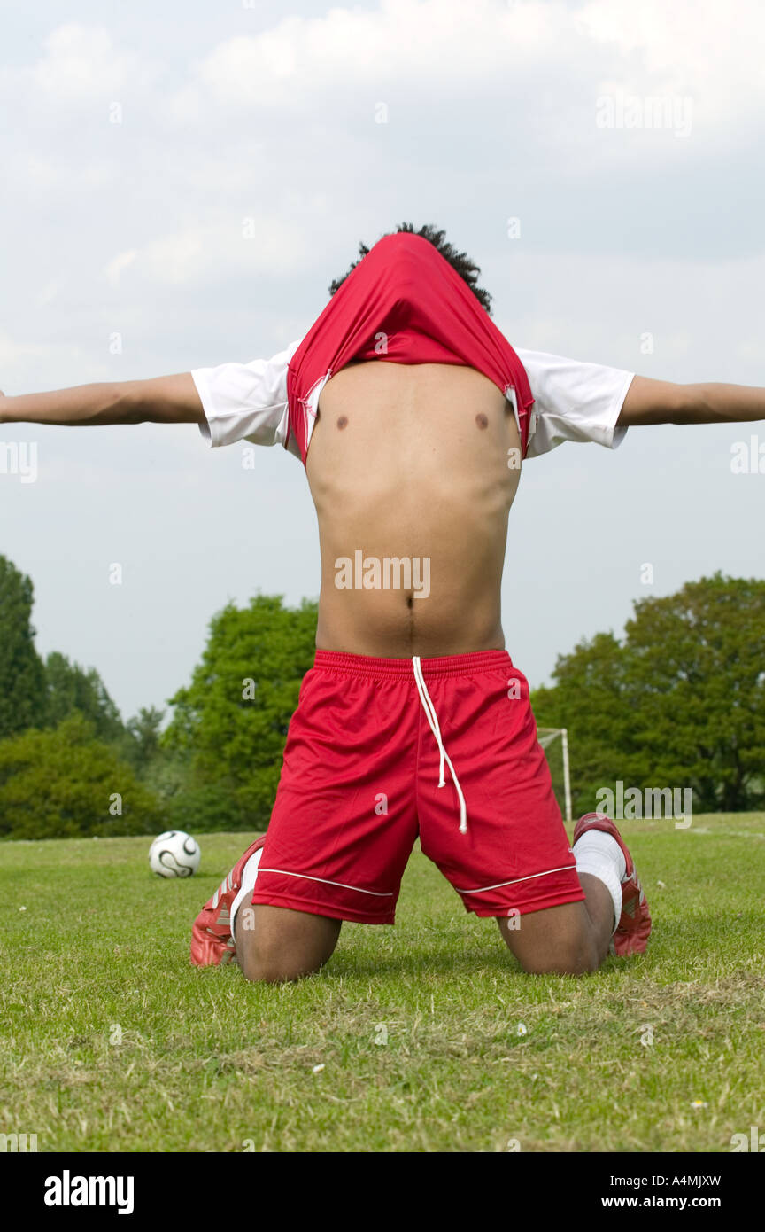 Soccer shirt over head hires stock photography and images Alamy