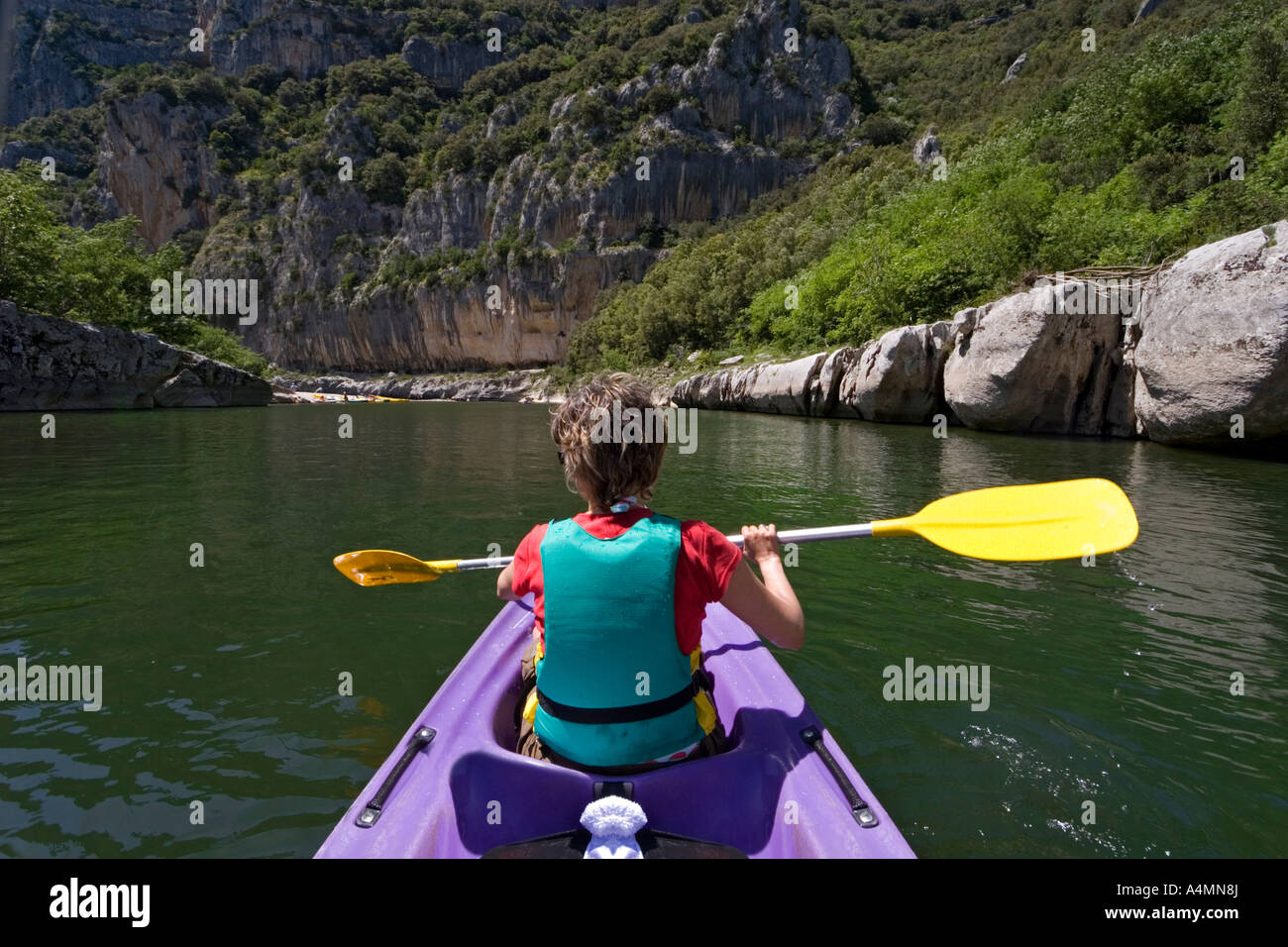Going down the gorges of the Ardeche river in a canoe (France).  Descente des Gorges de l'Ardèche en canoë (France). Stock Photo