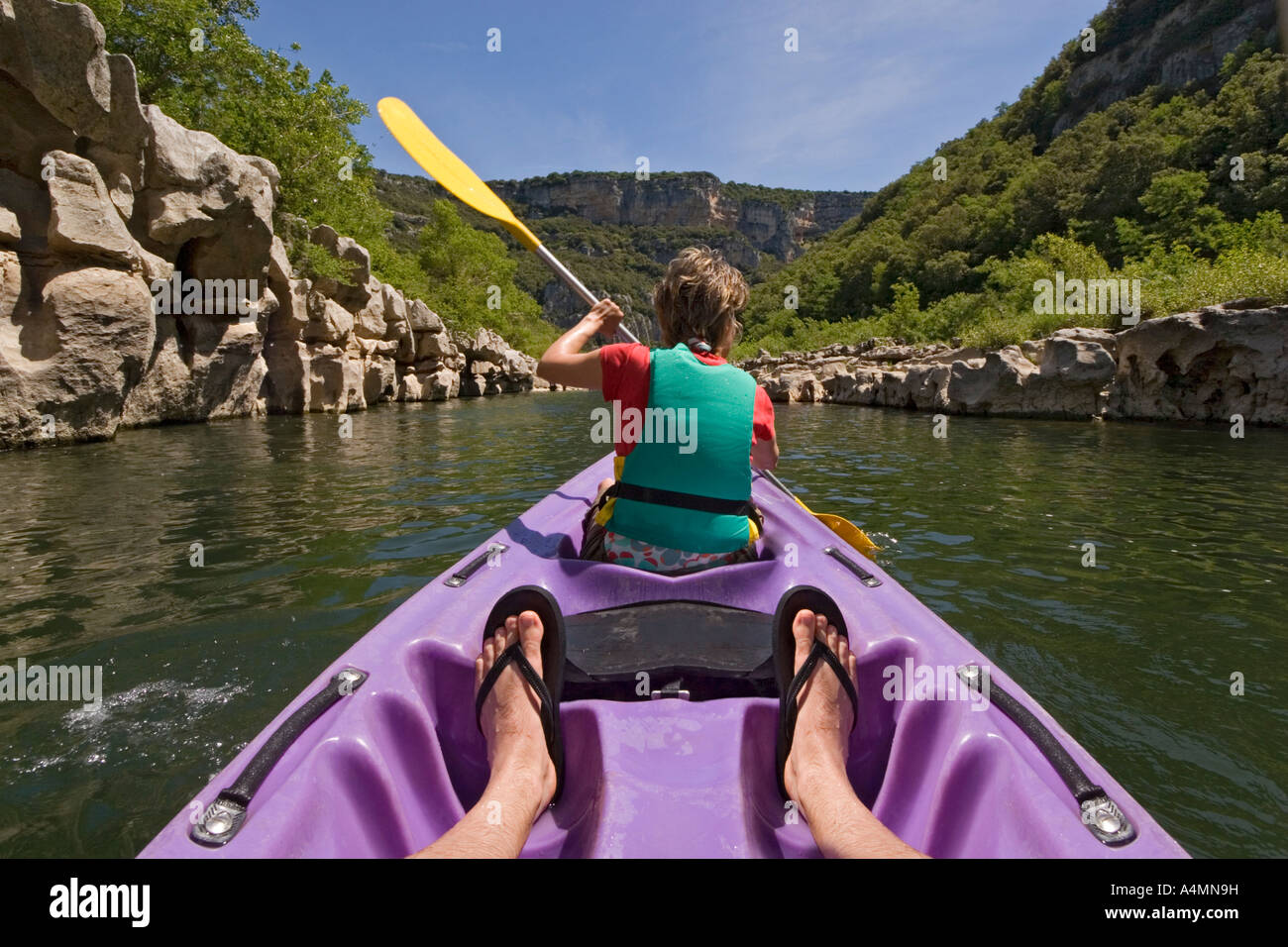 Going down the gorges of the Ardeche river in a canoe (France).  Descente des Gorges de l'Ardèche en canoë (France). Stock Photo