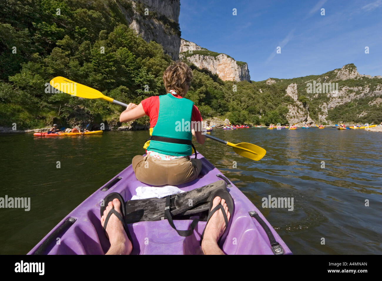 Going down the gorges of the Ardeche river in a canoe (France).  Descente des Gorges de l'Ardèche en canoë (France). Stock Photo