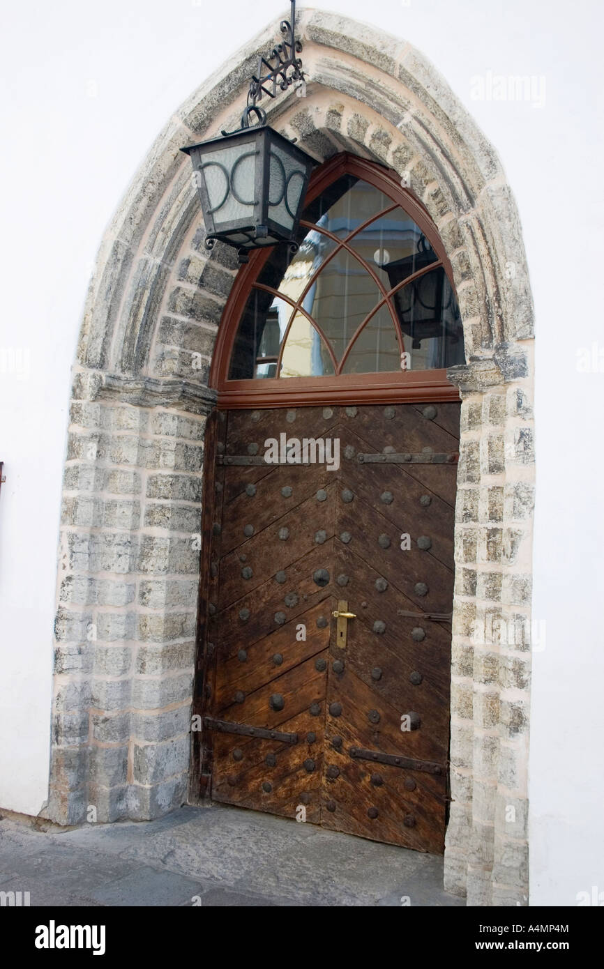 Old wooden door in stone arch Tallinn Estonia Stock Photo - Alamy
