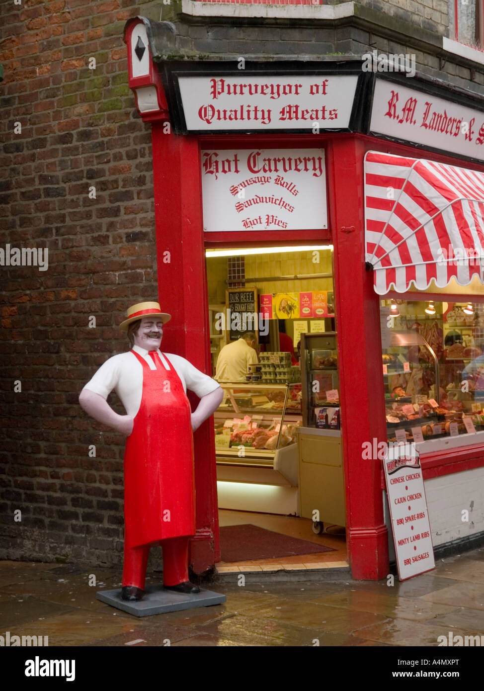 Butchers shop with a life size red butcher dummy in Whitby North