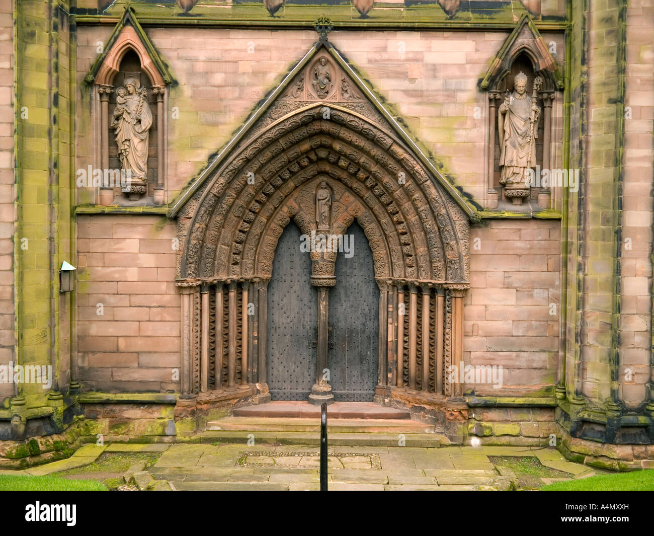 Pointed arches over the south door at Lichfield Cathedral Stock Photo