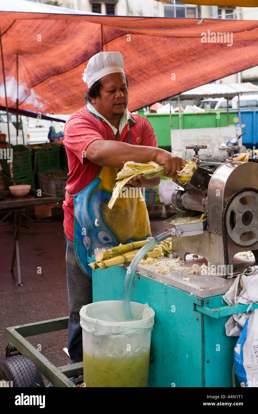 Malaysia Borneo Sarawak Kuching Sunday Market sugar cane juice stall