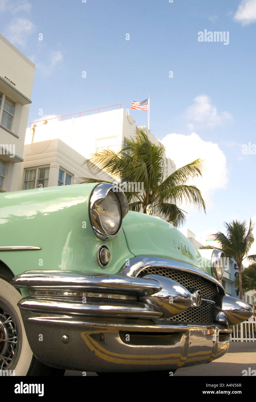 A classic fifties Buick parked outside an art deco hotel on Ocean drive Miami Florida Stock Photo