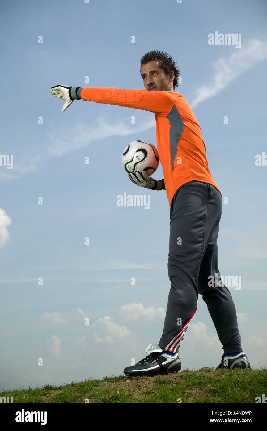 Goalkeeper man throwing ball hires stock photography and images Alamy