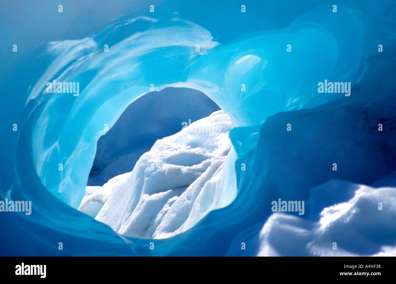 Ice caves can be visited on helihiking trips to Fox Glacier on the