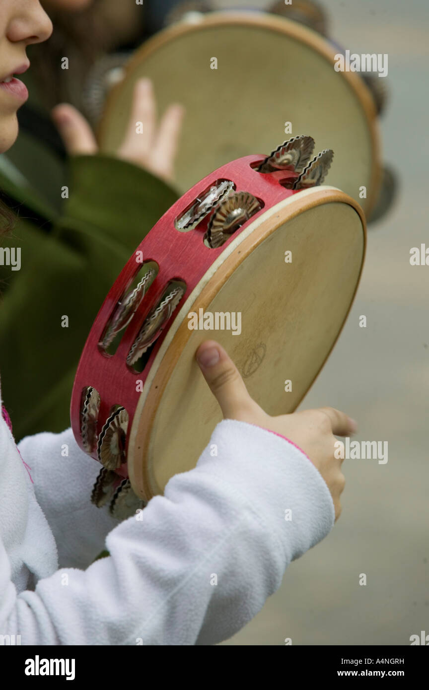 Young Basque women playing the tambourine, Plaza Nueva, Bilbao Stock Photo