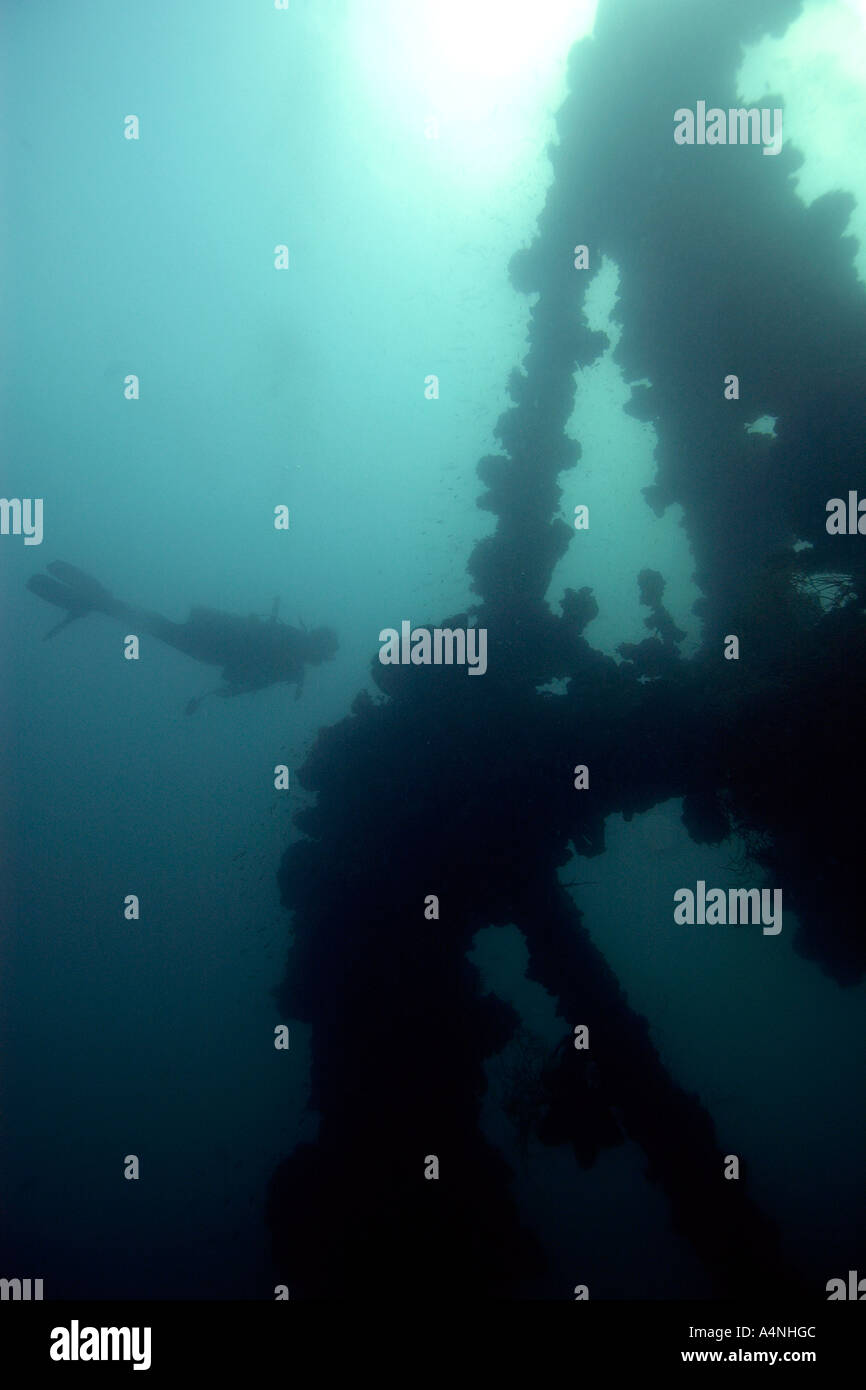 Diver silhouette on Iro Maru ship wreck a Japanese support ship sank in