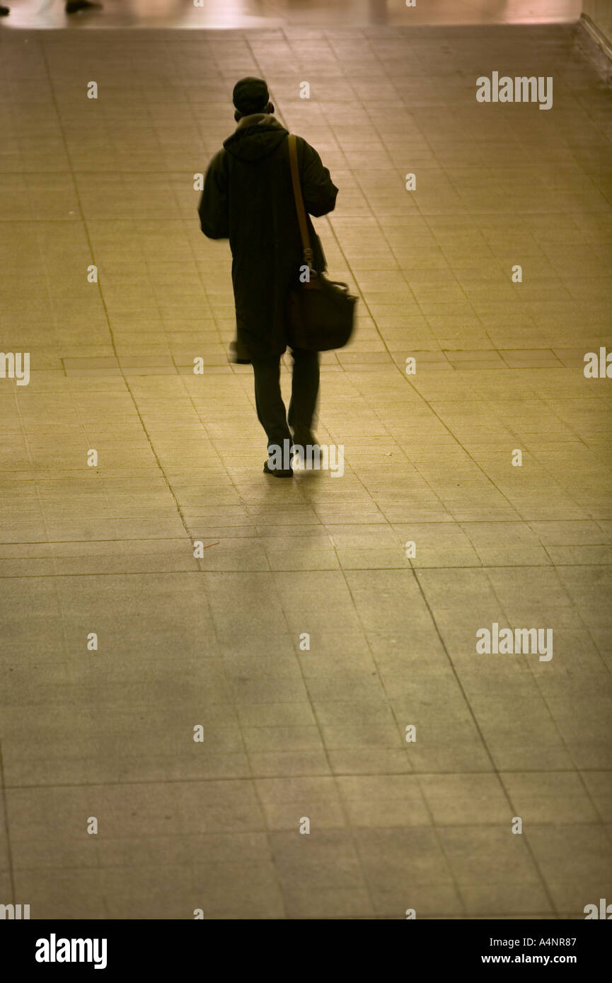 Man coat walking hi-res stock photography and images - Alamy