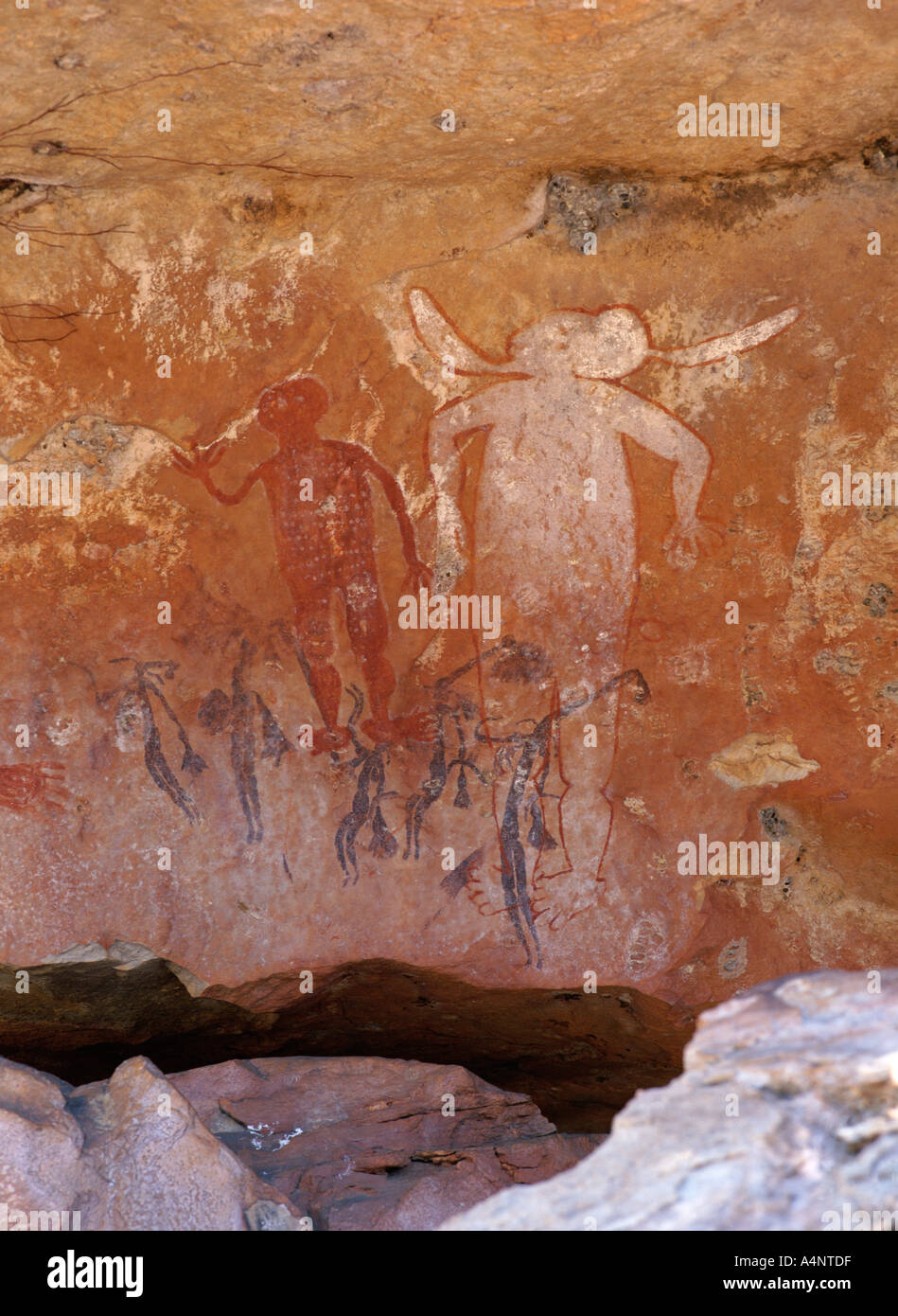 Aboriginal painted figures of varied periods over painted near King Edward River Kulumburu Road Kimberley Western Australia Stock Photo