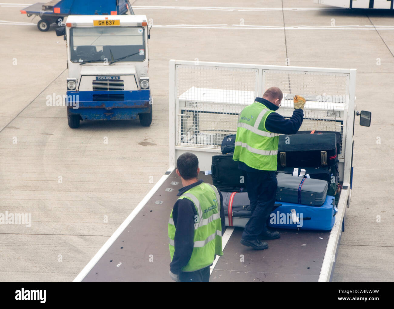 Baggage handlers at Gatwick airport London England Stock Photo