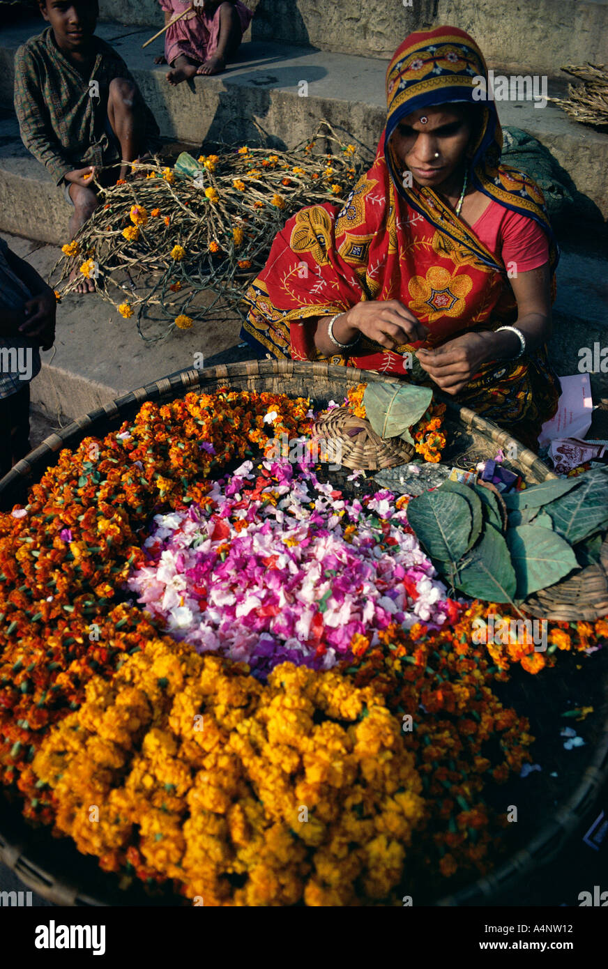 Flower seller Varanasi Benares Uttar Pradesh state India Asia Stock