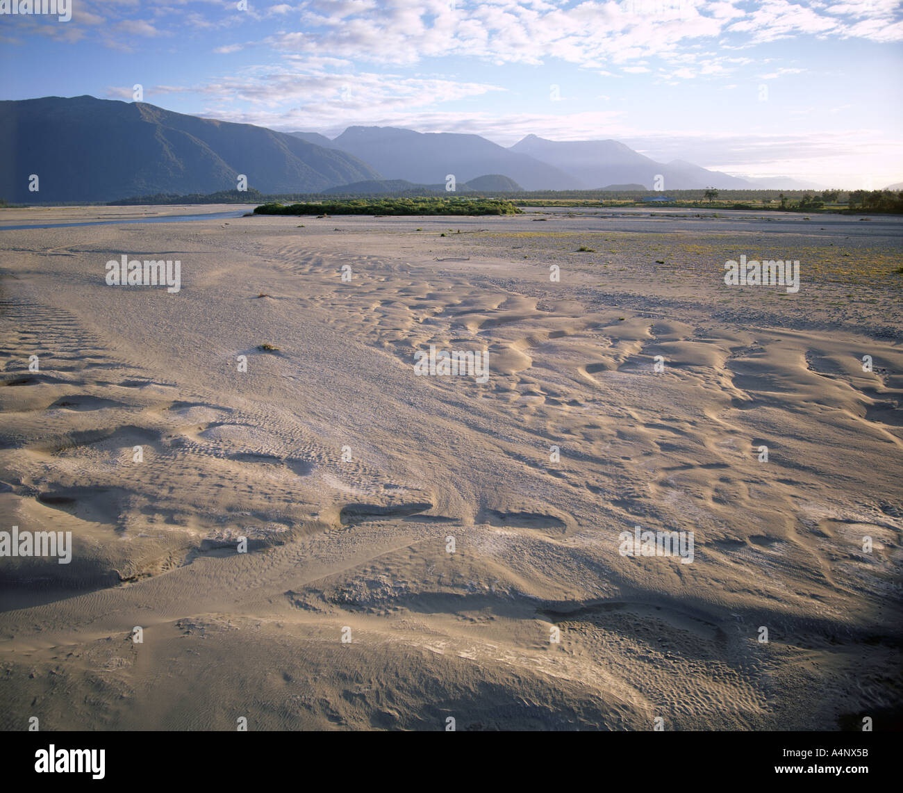 Flood plain with sand depressions Haast River Valley from road to Haast Pass the start of the main divide Haast Westland South Stock Photo