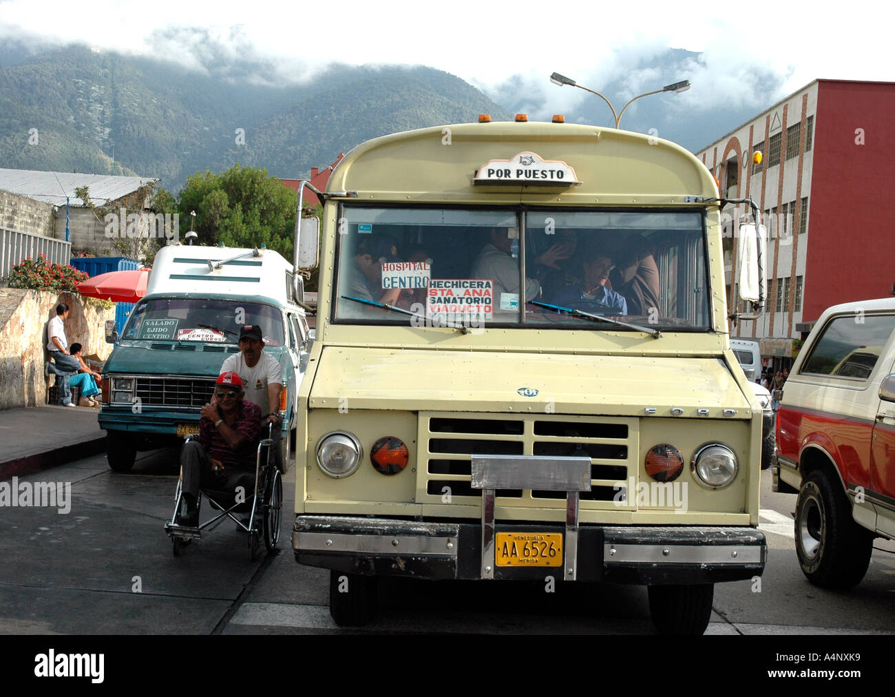 In Venezuela 'por puestos' on a Mérida street provide collective transport Stock Photo