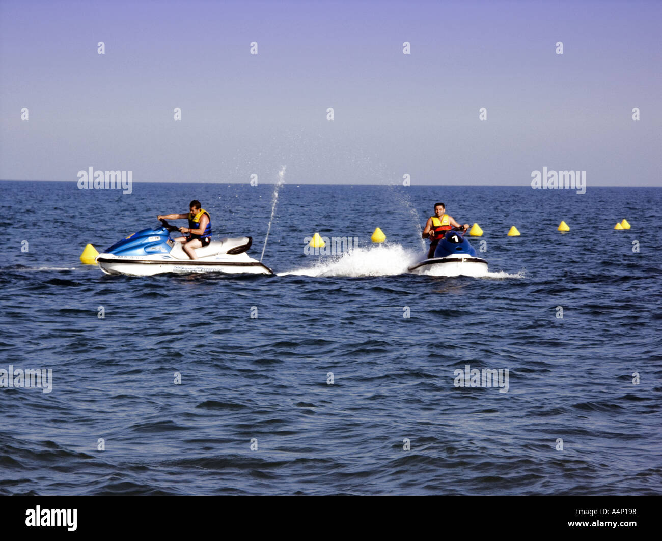 Jetskis in the Mediterranean La Cala de Mijas Mijas Costa Malaga Spain Stock Photo