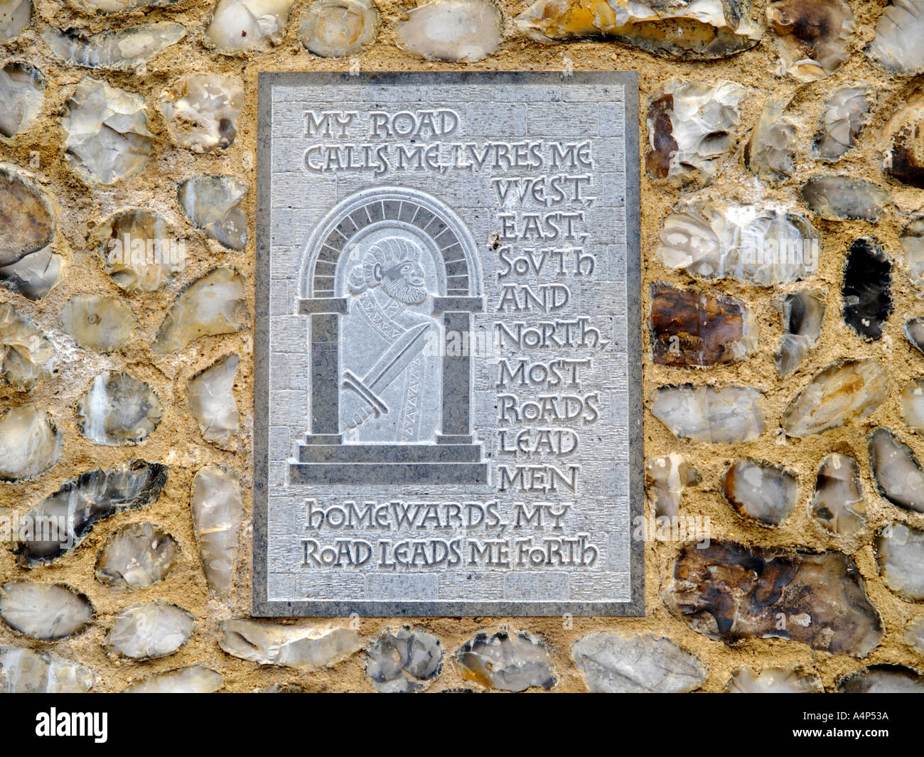STONE WITH ENSCRIPTIONS ON SET IN WALL OF THE CASTLE MOUND WALL NORWICH NORFOLK EAST ANGLIA ENGLAND UK Stock Photo