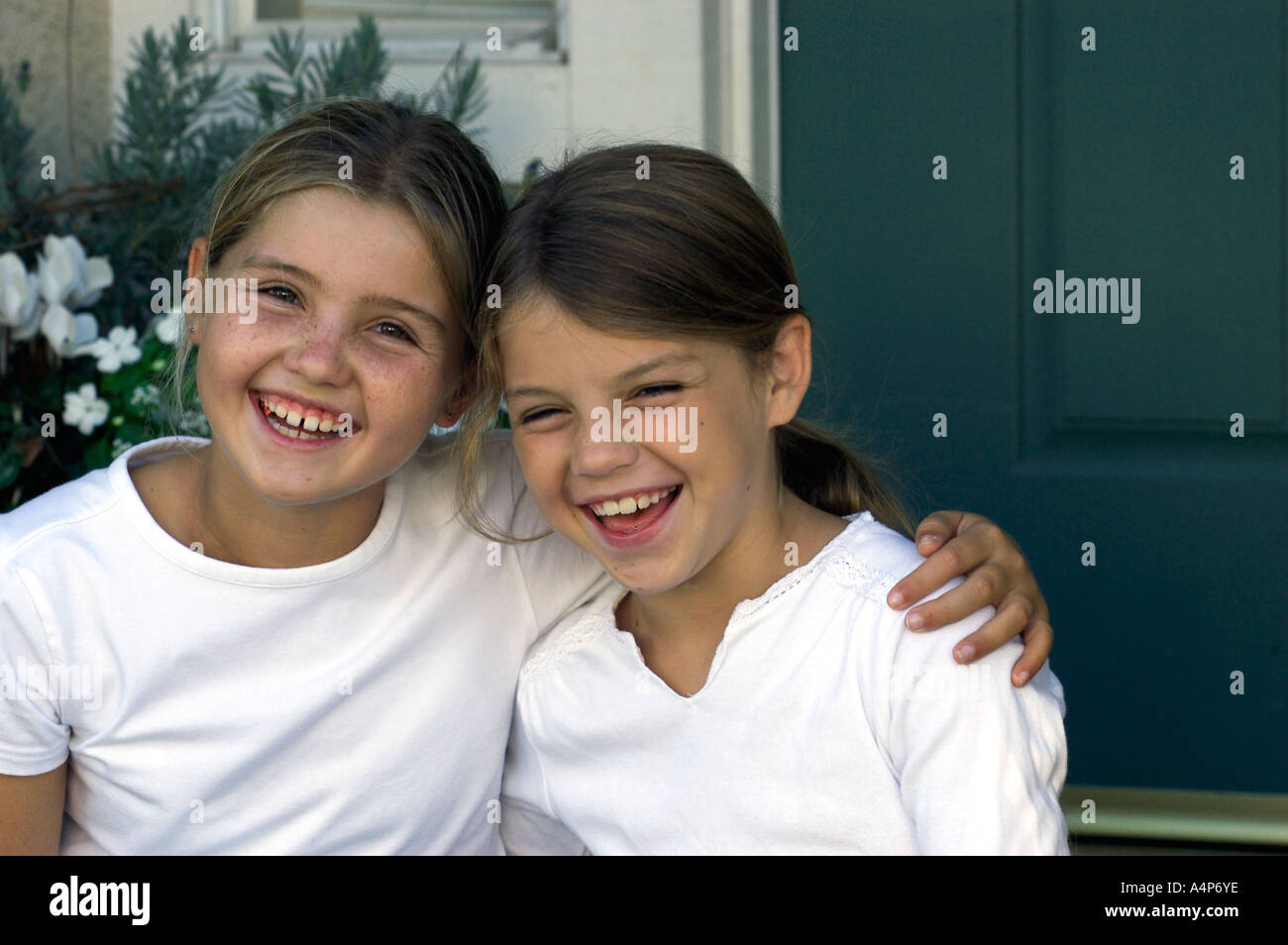 Happy laughing kid girls hi-res stock photography and images - Alamy