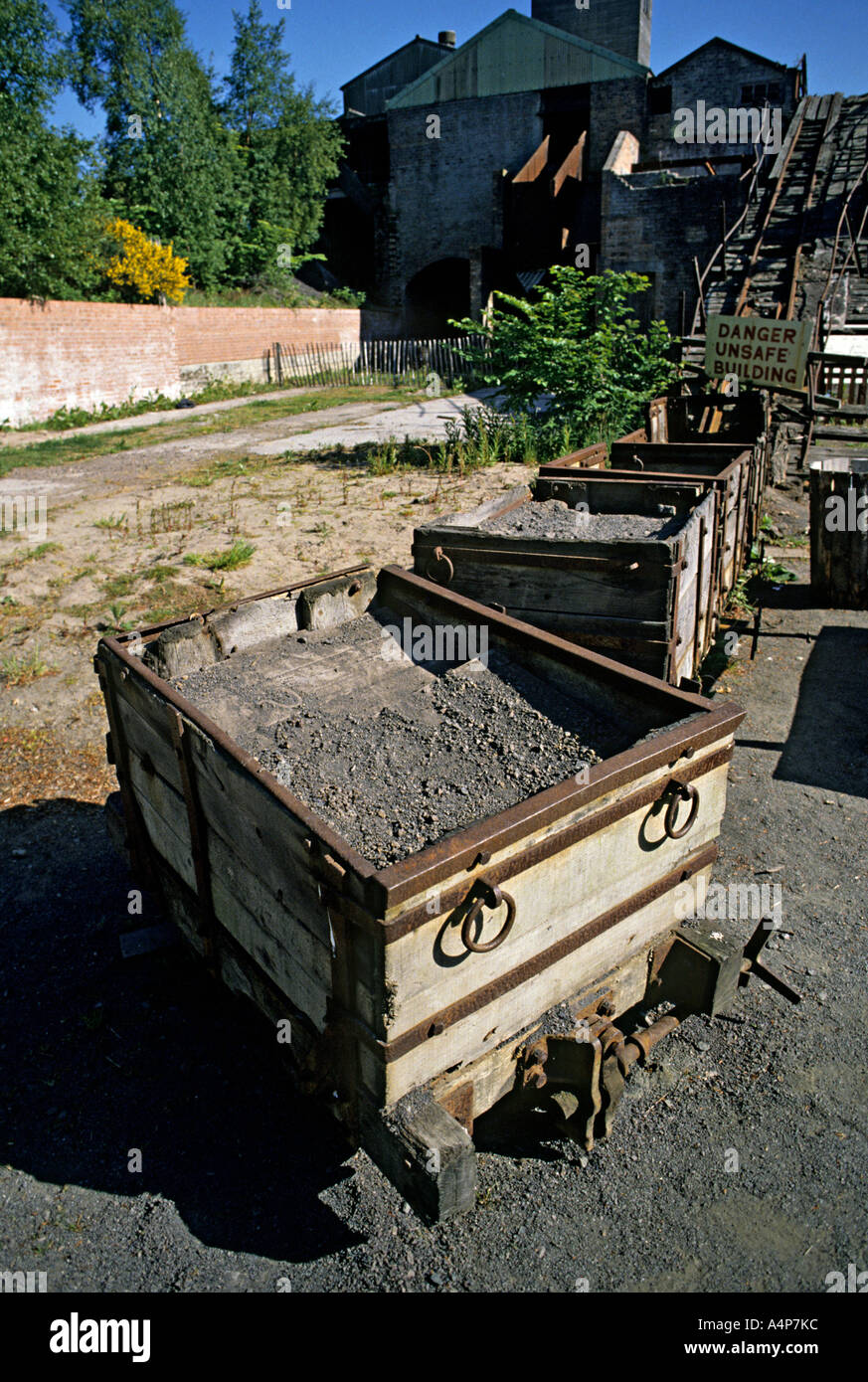 Trucks and surface remains at Birkhill Fireclay Mine workings Bo'ness Scotland Stock Photo