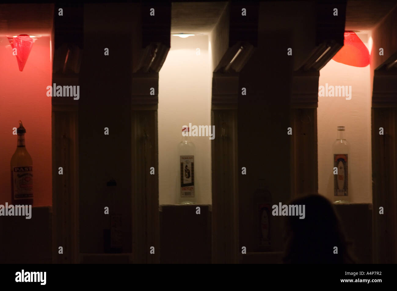 Night club bar in low lighting with bottles Stock Photo Alamy