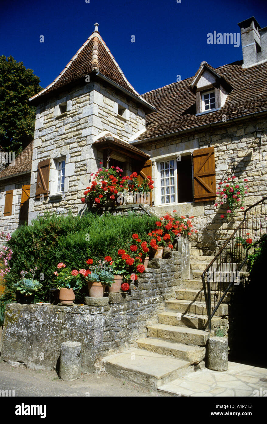 House with flowers in garden at Lavergne Lot France Stock Photo Alamy