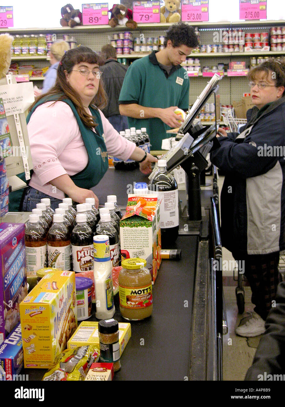 Customers in the check out line of a super market in El Calafate