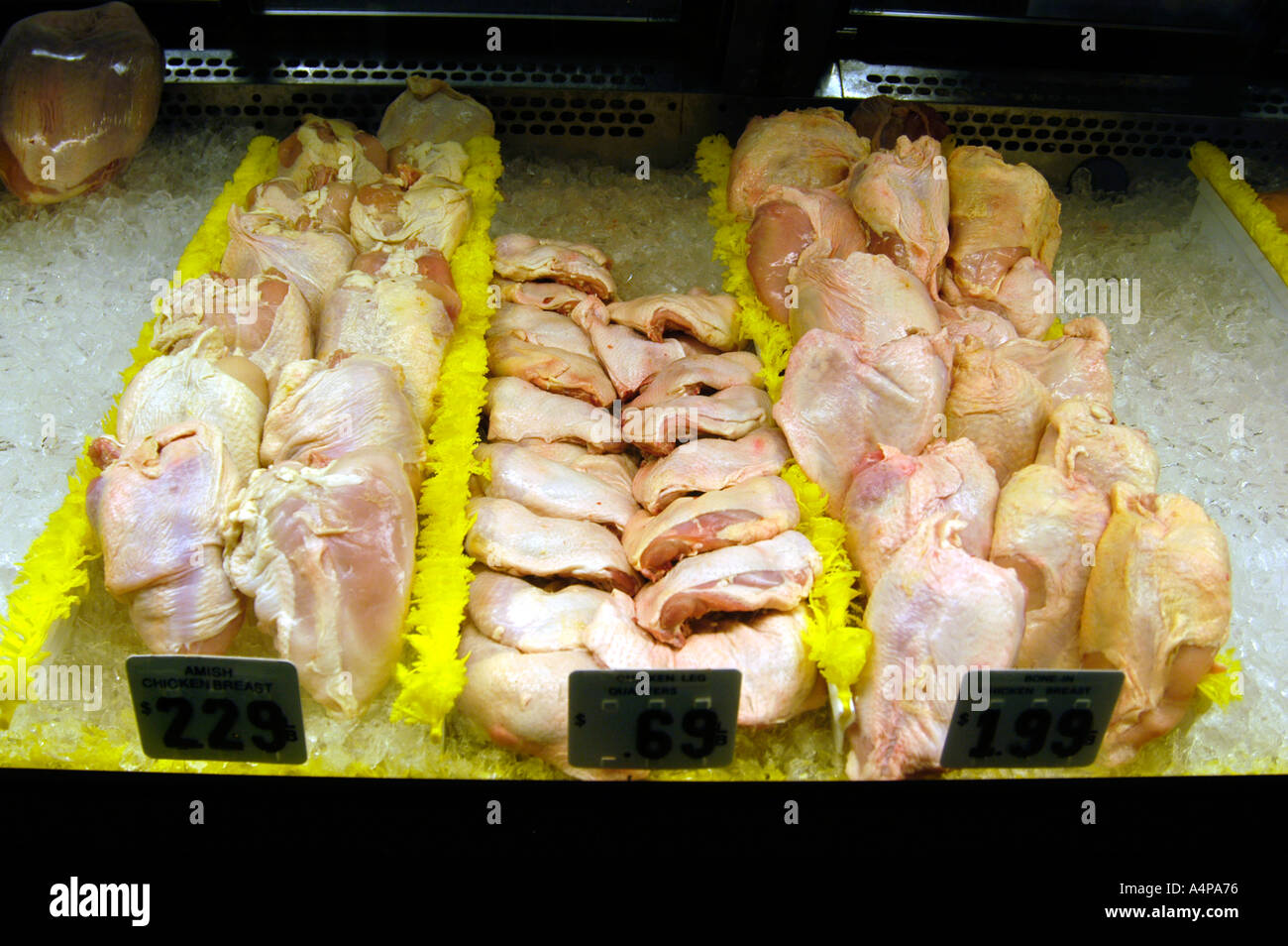 Fresh red meat fish vegetables fruit and poultry on display in a meat