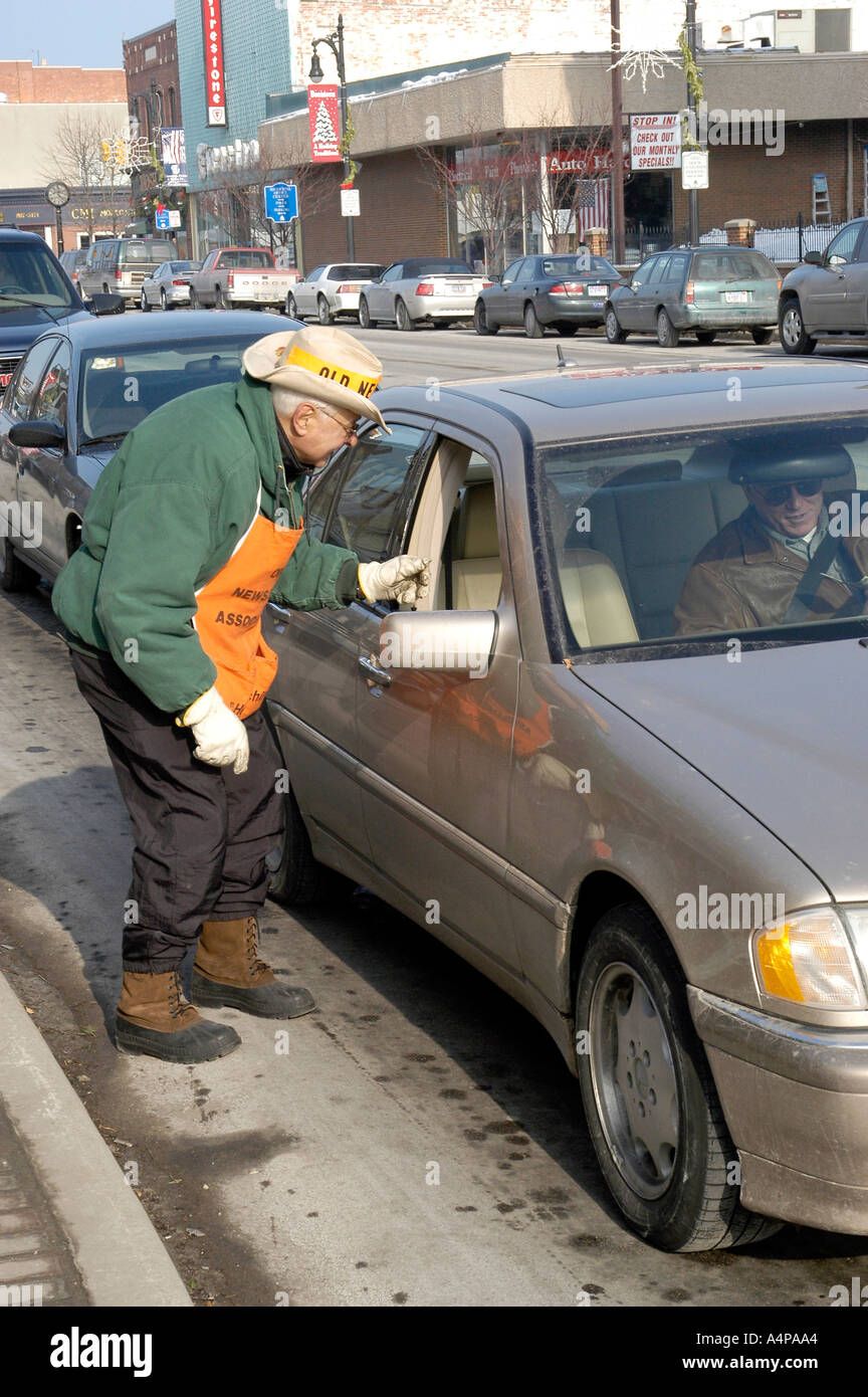 Old news boys sell newspaper to raise money for Christmas gifts for needy children Stock Photo