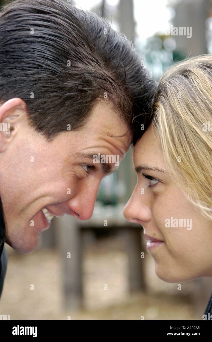 Young adult male and female couple in a loving passionate relationship Stock Photo