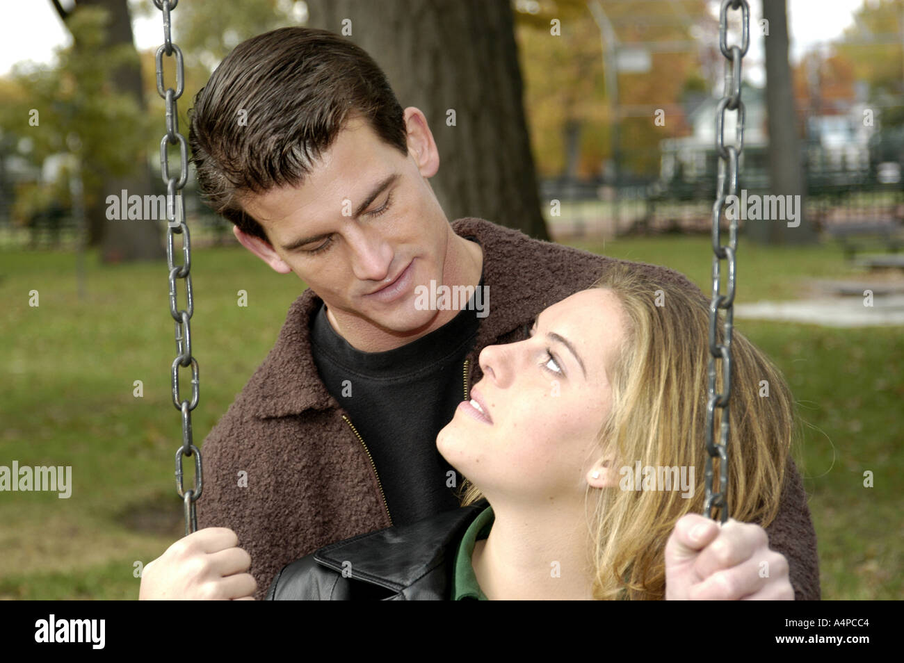 Young adult male and female couple in a loving passionate relationship Stock Photo