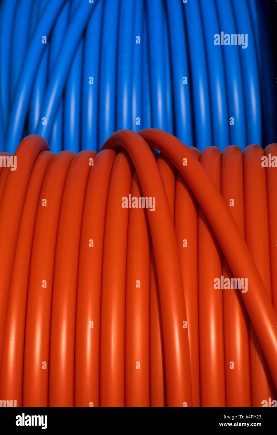 Blue and orange cable coils. Tubing used as conduit for high speed