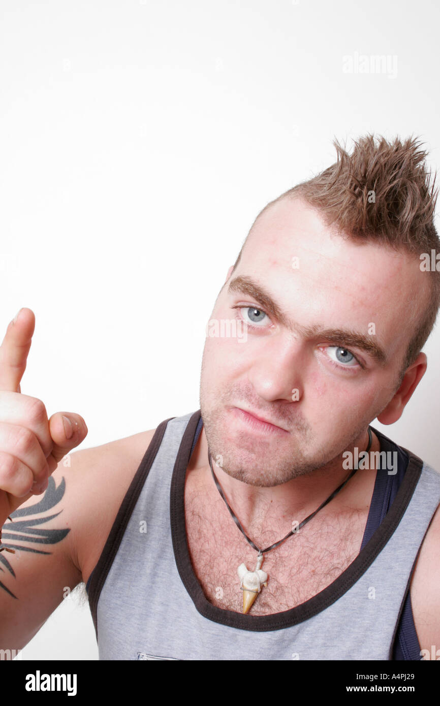 Mohican Hair Cut Young Man Age Between 20 And 25 Pointing His