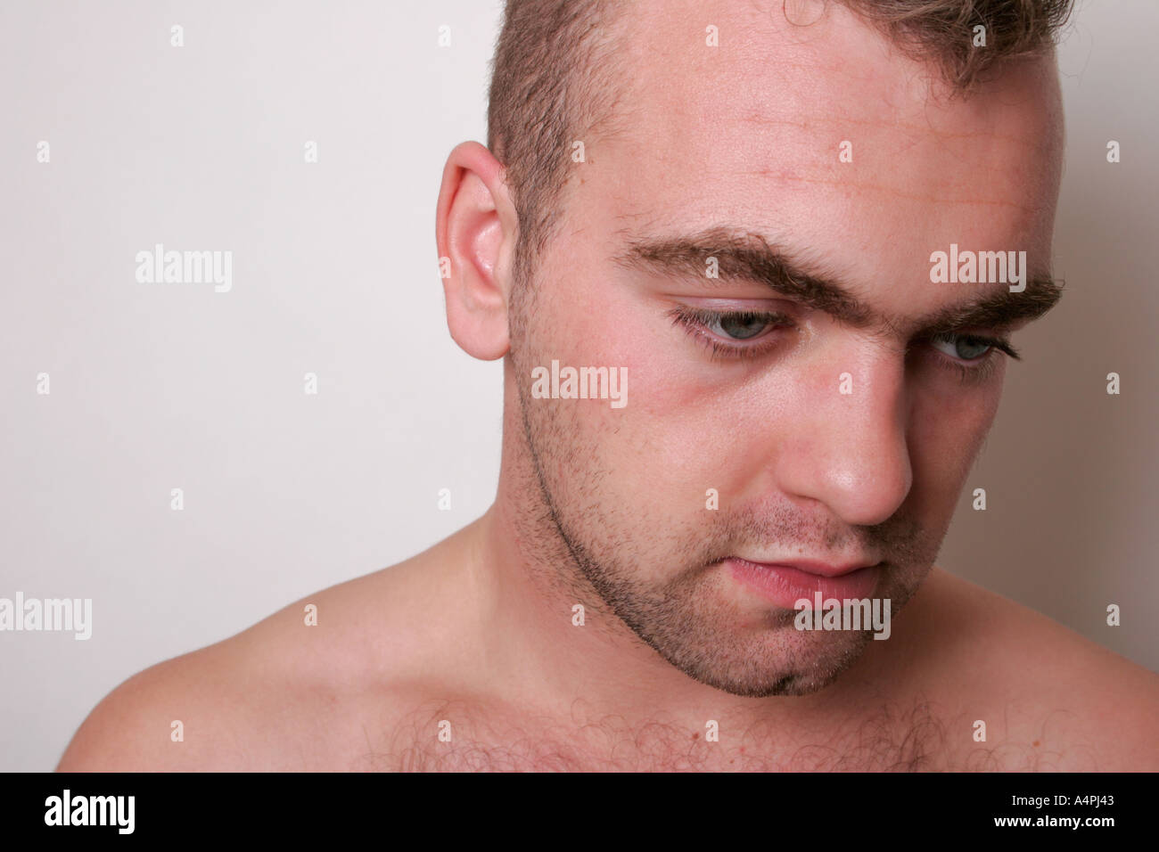Mohican Hair Cut Young Man Age Between 20 And 25 Looking Down Shot