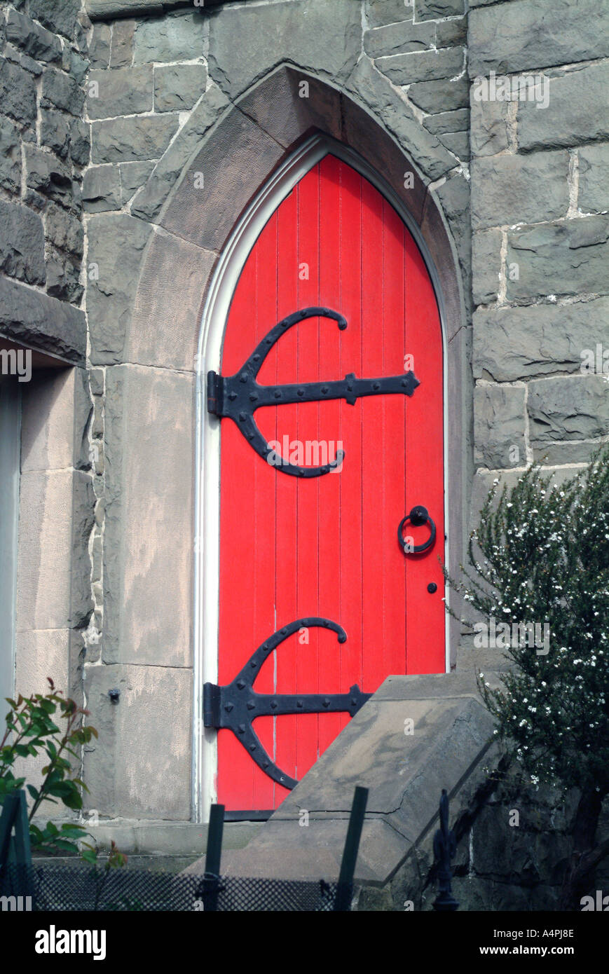 Red Entrance Door To Church In San Francisco Stock Photo