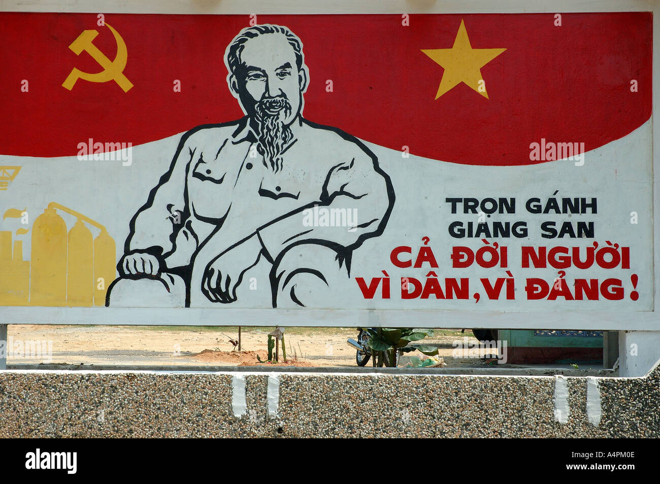 Roadside billboard sign hoarding depicting Uncle Ho Chi Minh Vietnam South East Asia Asian orient oriental Stock Photo