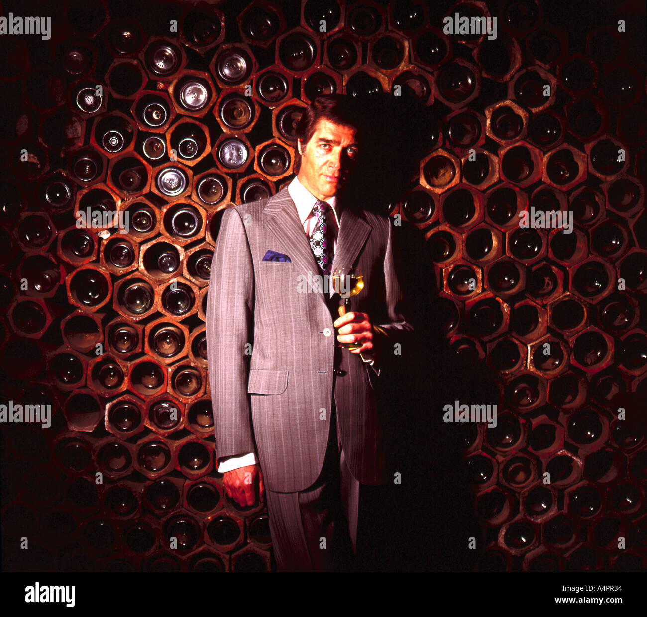Man in wine cellar Stock Photo - Alamy