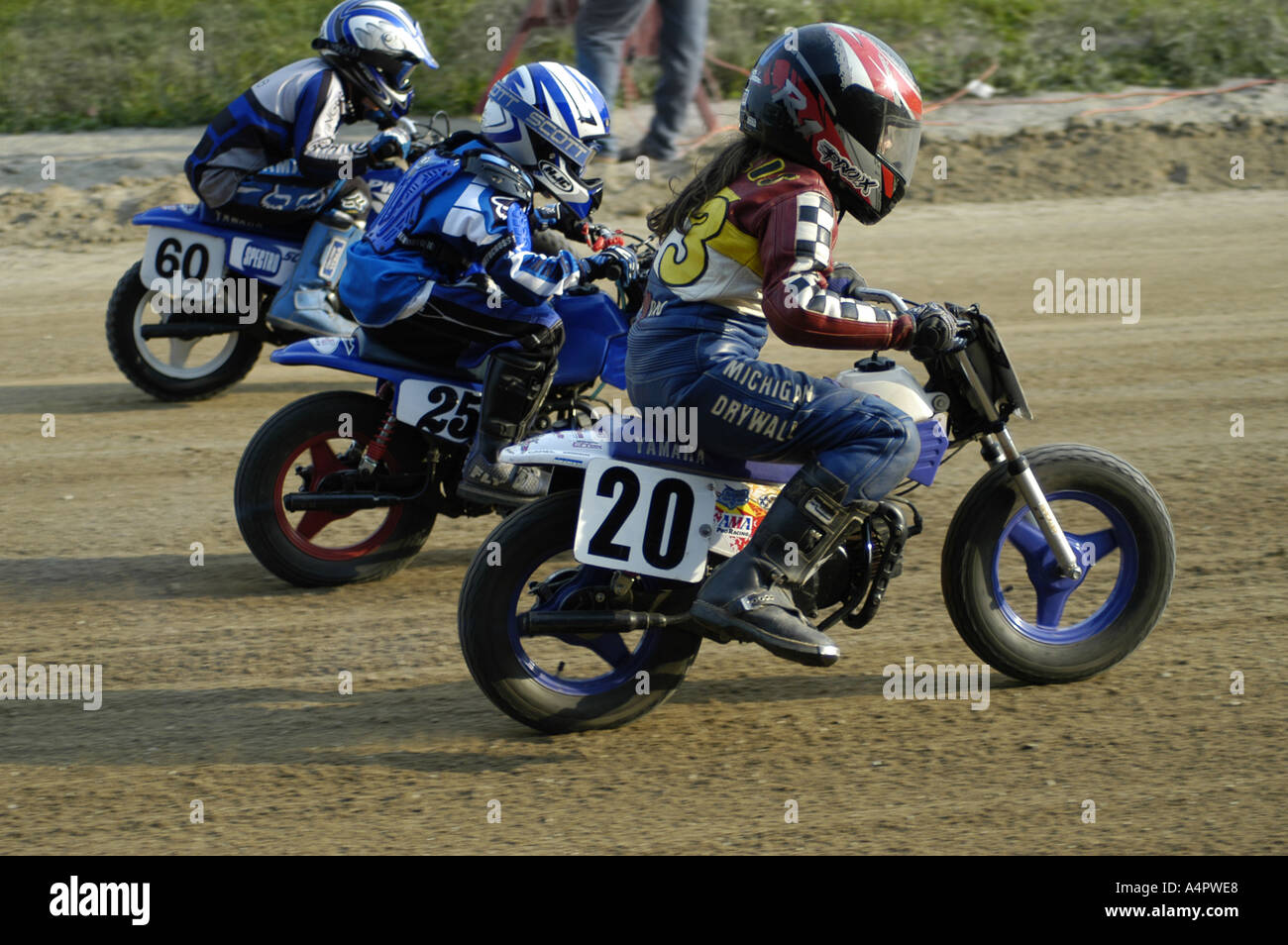 3 children at the start of dirt track race Stock Photo Alamy