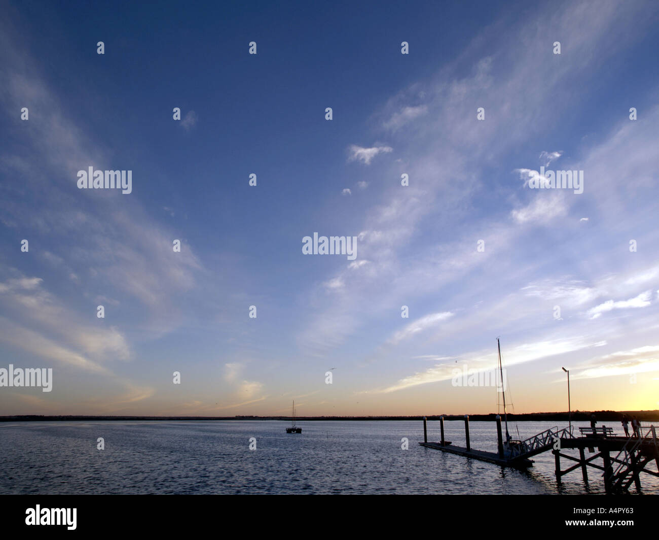 EVENING DUSK LIGHT WITH BOAT ON JETTY PORT BROUGHTON YORKE PENINSULAR SOUTH AUSTRALIA Stock Photo