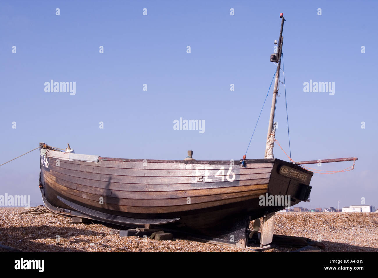 Traditional wood built fishing boat on the shingle beach at Dungeness ...