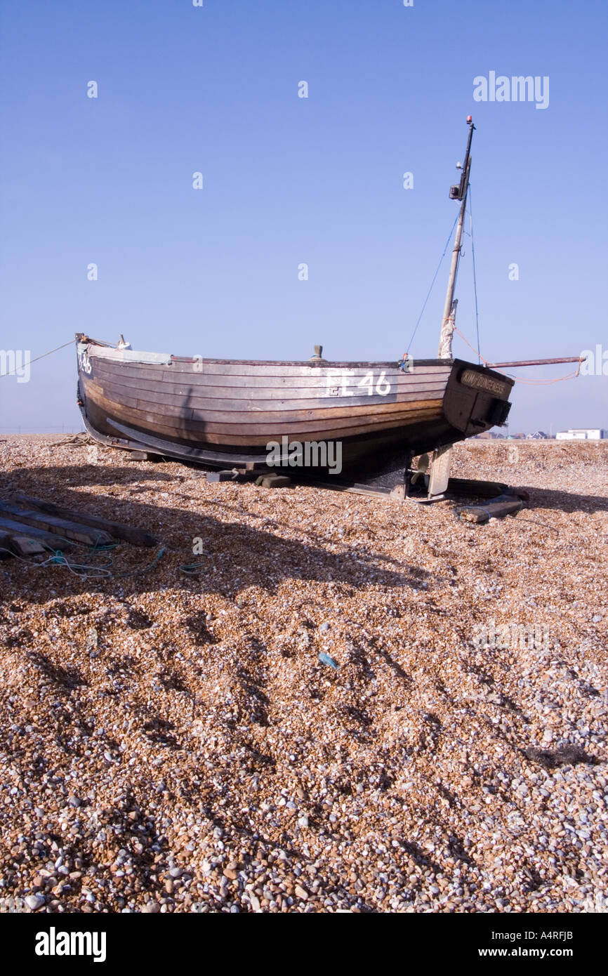 Traditional wood built fishing boat on the shingle beach at Dungeness ...