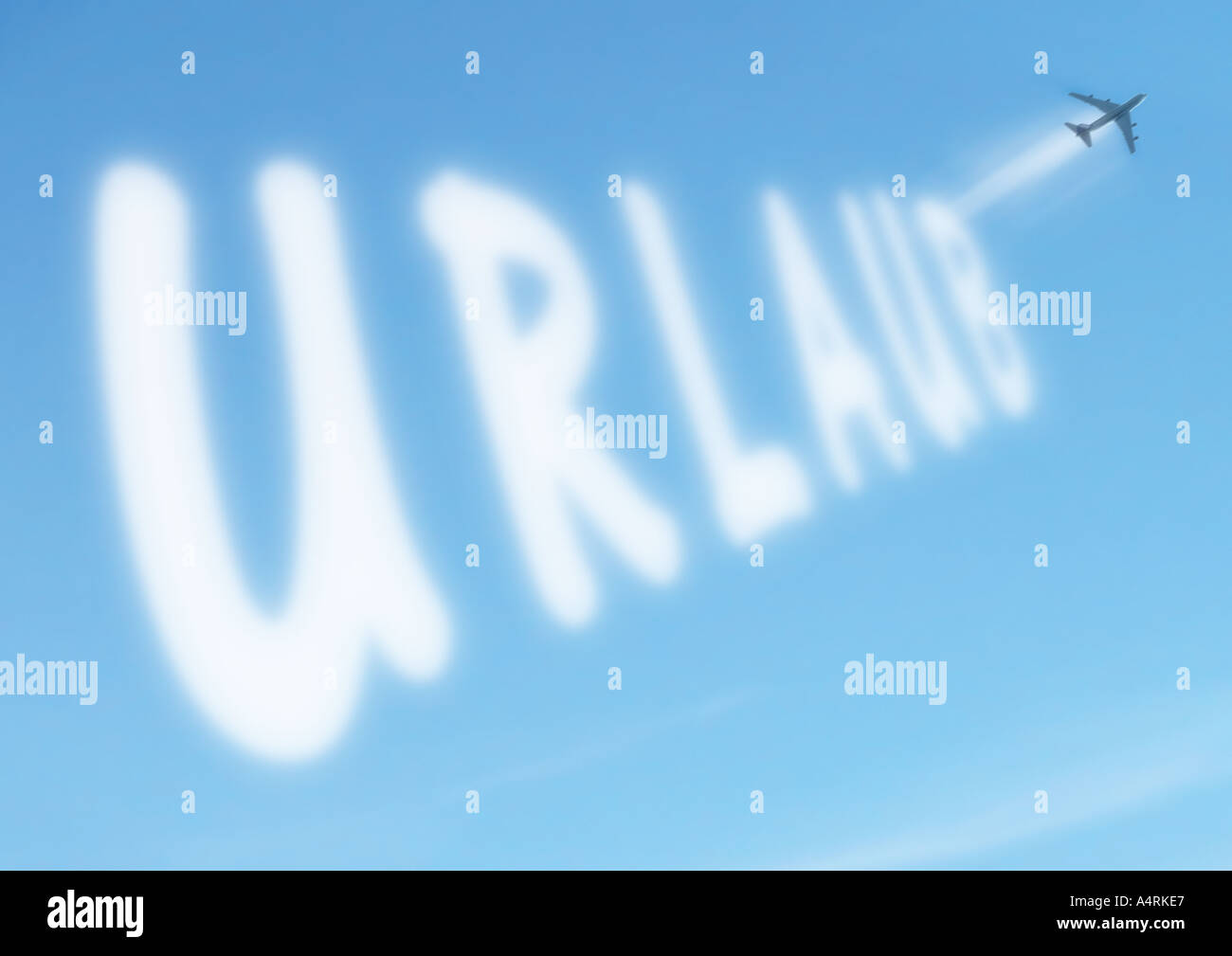 Urlaub german word Urlaub written in the sky Stock Photo