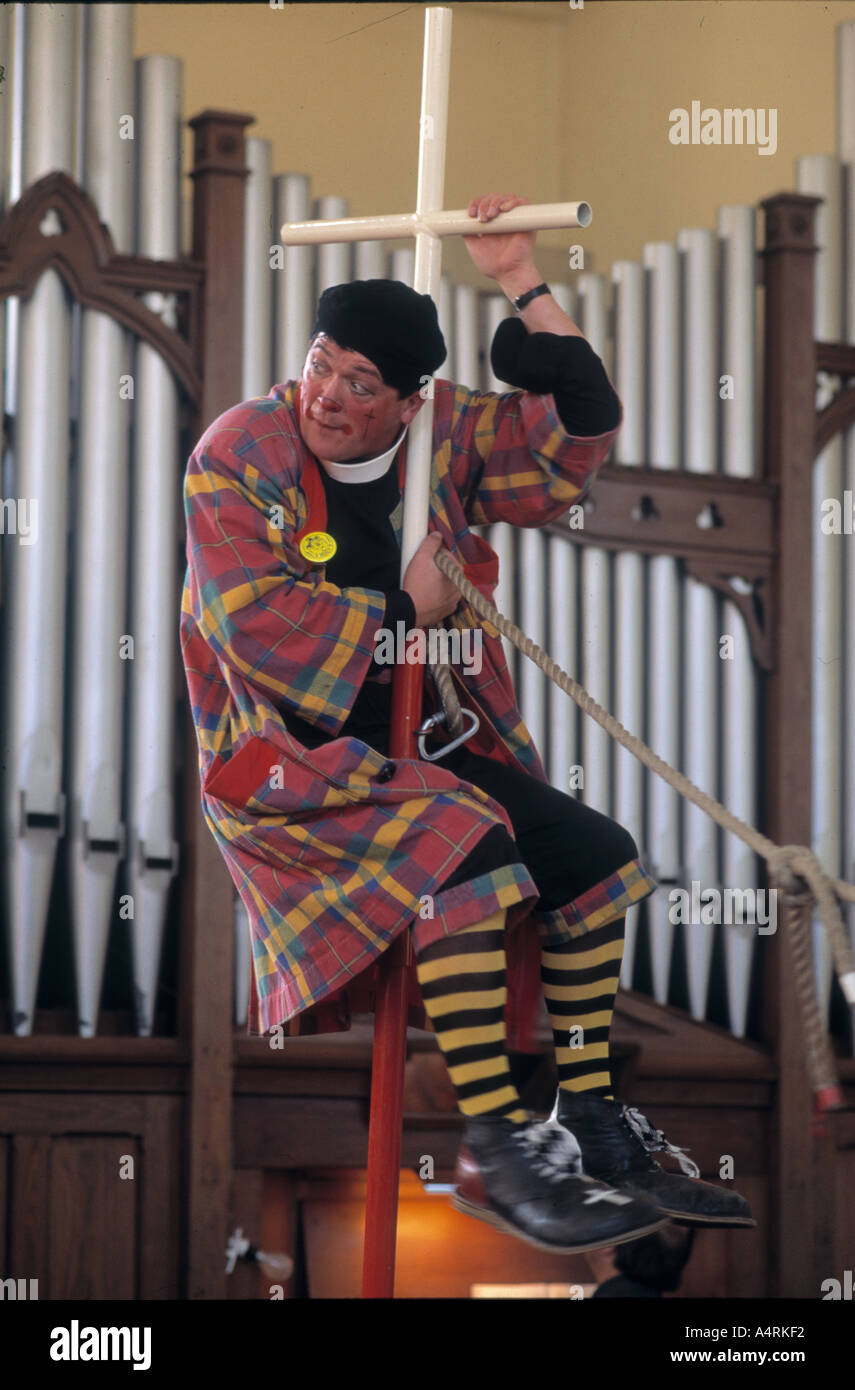 Reverend Roly Bain uses clown costumes and make up at St John s Church Southborough Kent UK Stock Photo