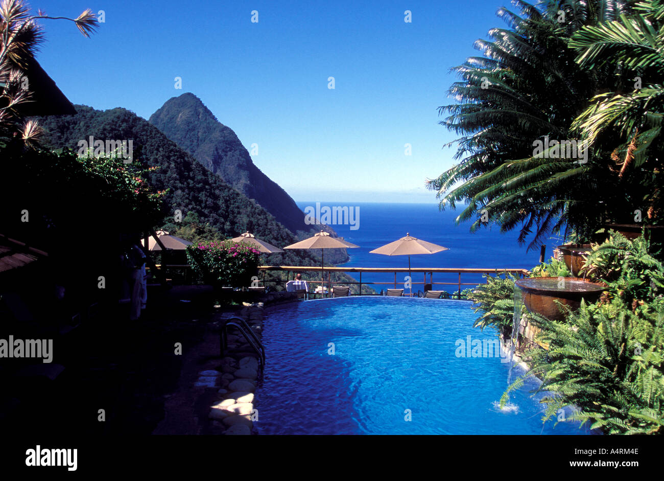 The pool at the Ladera resort overlooking the pitons Volcanic mountains