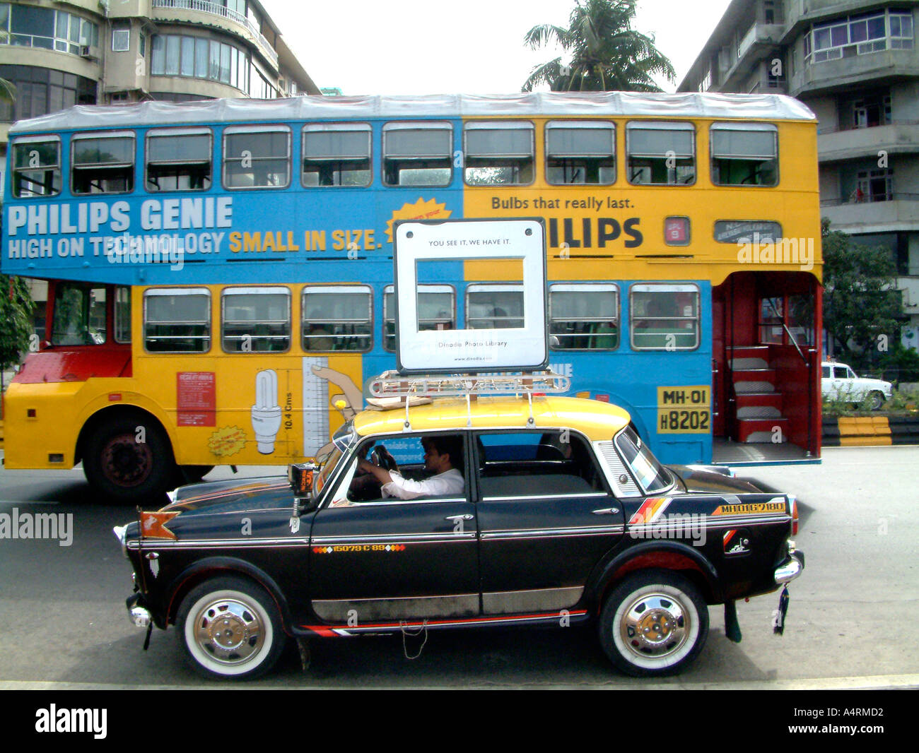 SOA98749 Dinodia Photo Library promotion on taxi mounted with slide mount  Bombay Mumbai Maharashtra India Asia Stock Photo