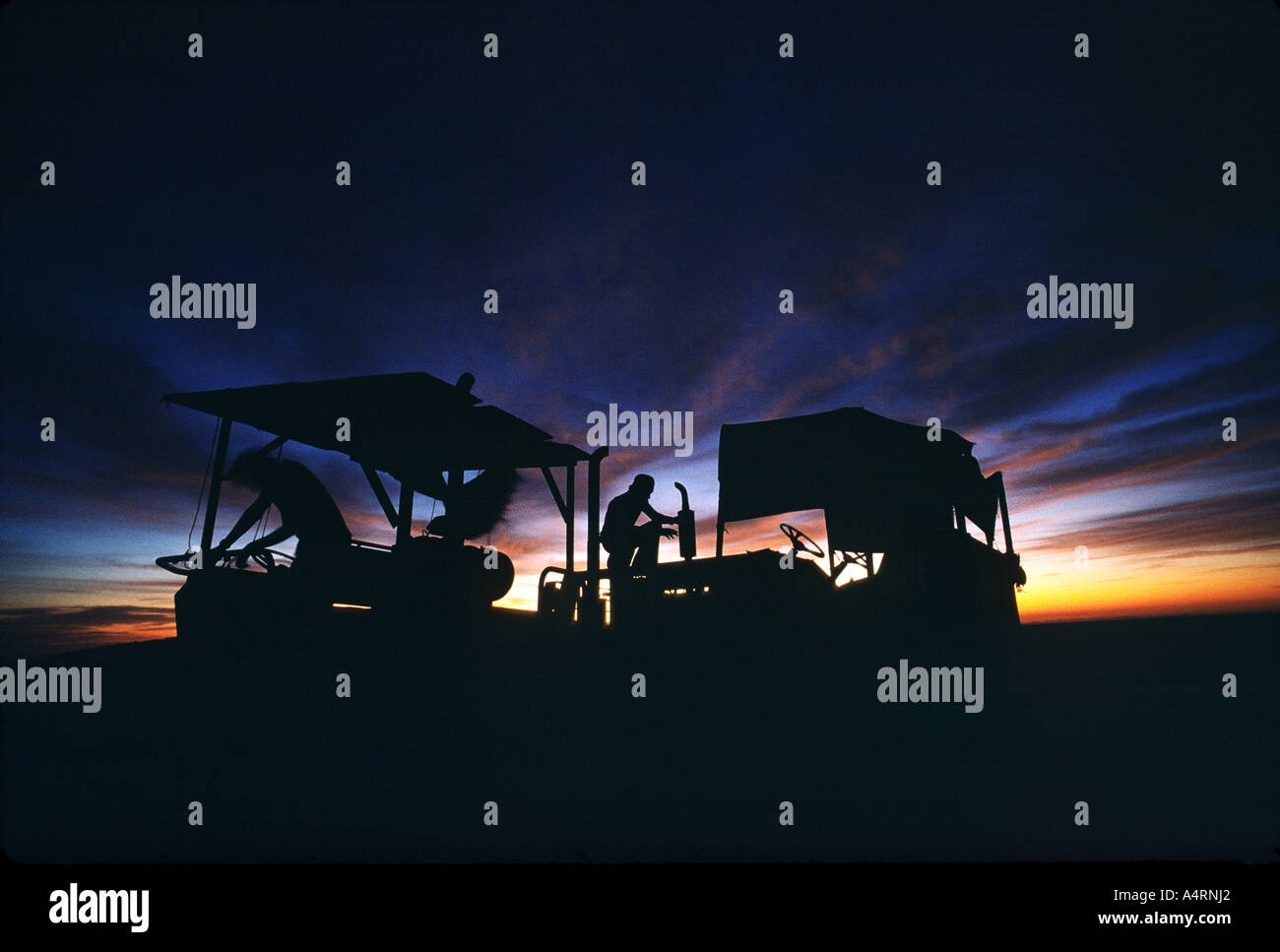 Two men get ready for a day of constructing a major highway in Oman. Stock Photo