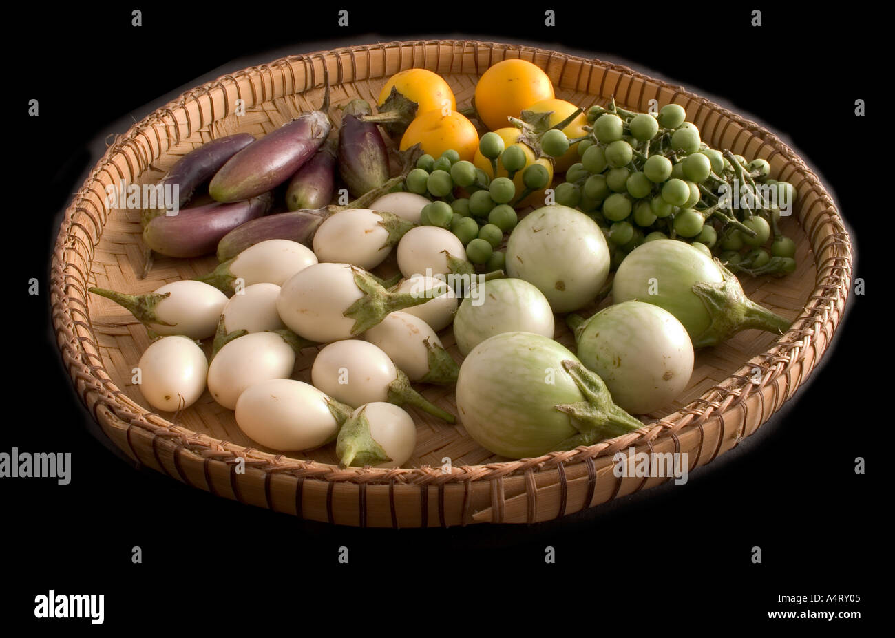 Aubergine varieties black background Stock Photo