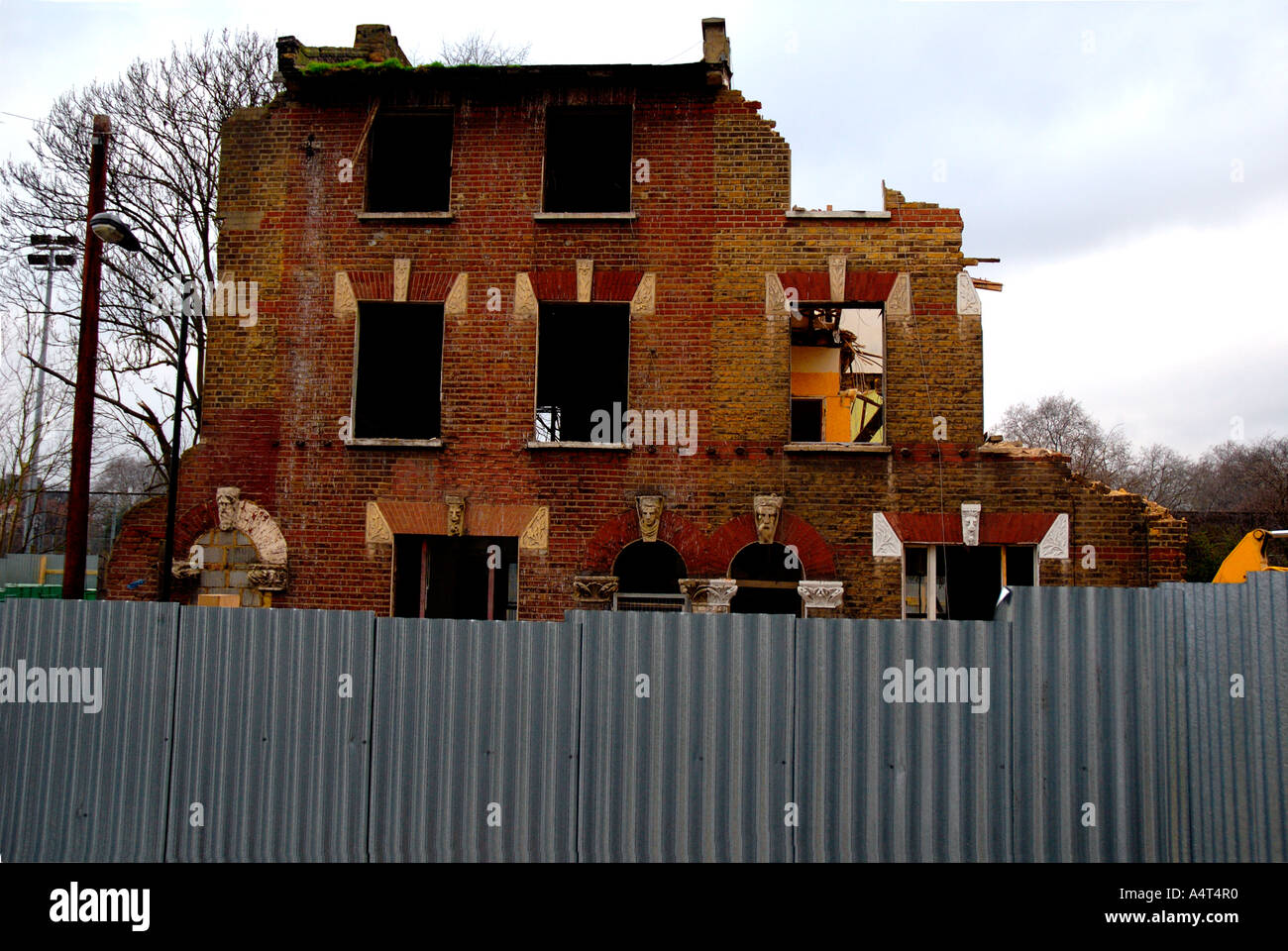 Demolition of row of Victorian houses previously squatted in St Agnes Place Kennington South London. Stock Photo