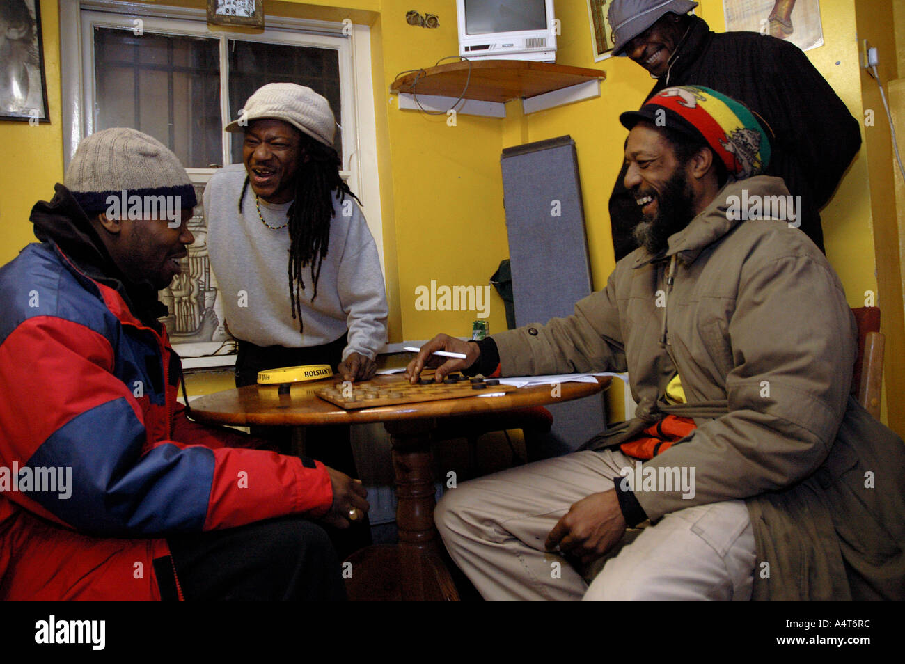 Playing draughts in the Rastafarian Community Centre in St Agnes Place Kennington South London. Stock Photo