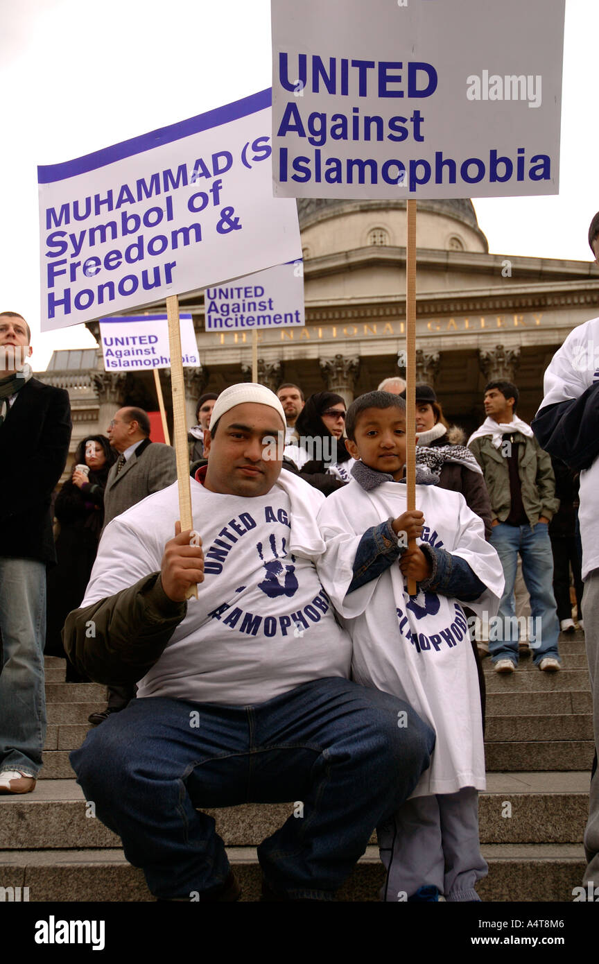 Young boy and father at Demonstration by Muslims in Central London  protesting against Islamophobia and racial incitement FEB 20 Stock Photo