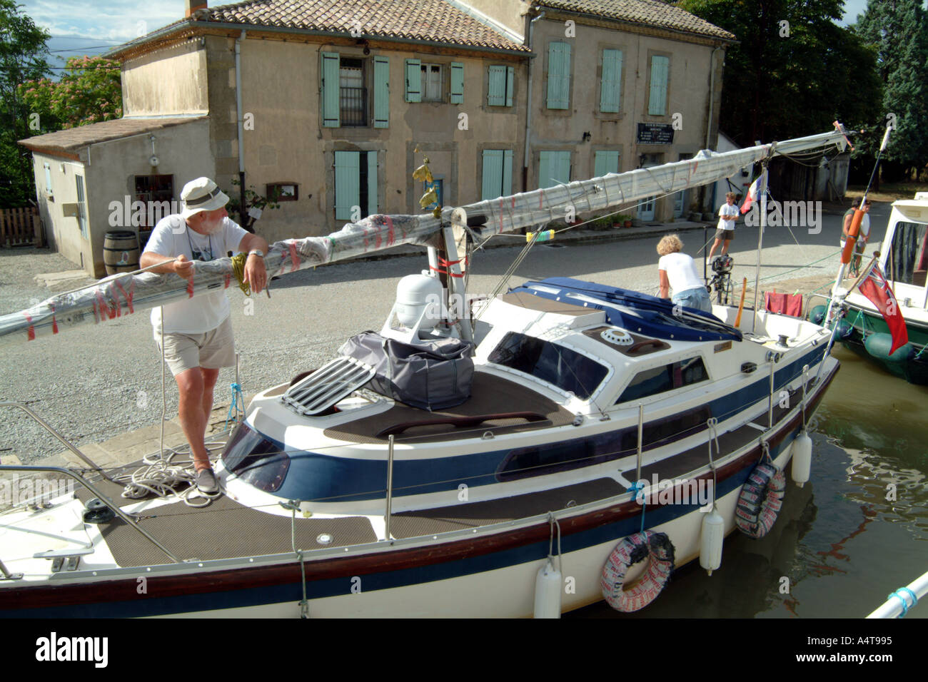 Newbridge 26 Yacht called Pioneer Spirit with mast down in Puicheric Lock on Canal du Midi Southern France Stock Photo